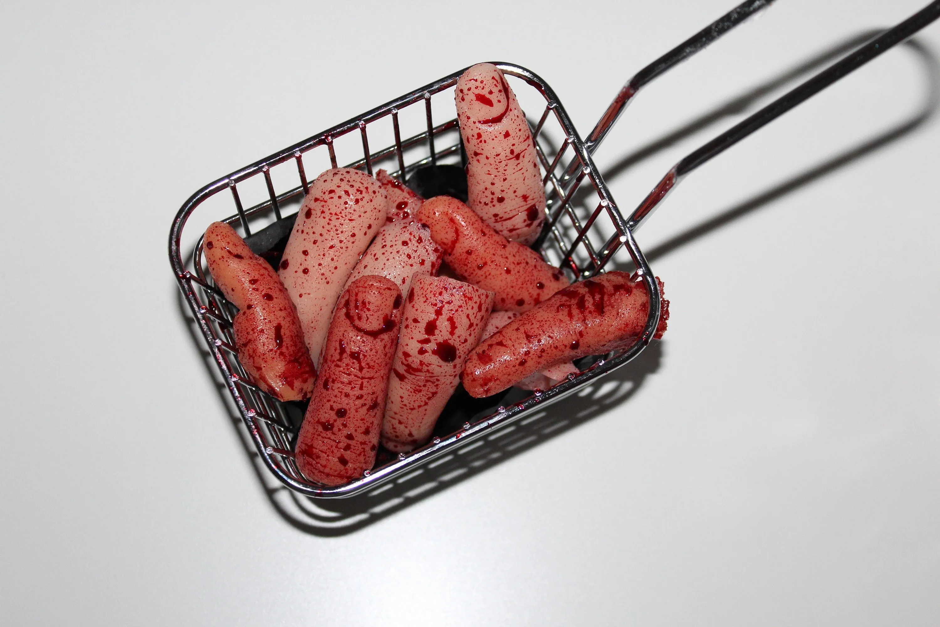 Deep Fried Severed Fingers in Metal Fryer Basket Prop